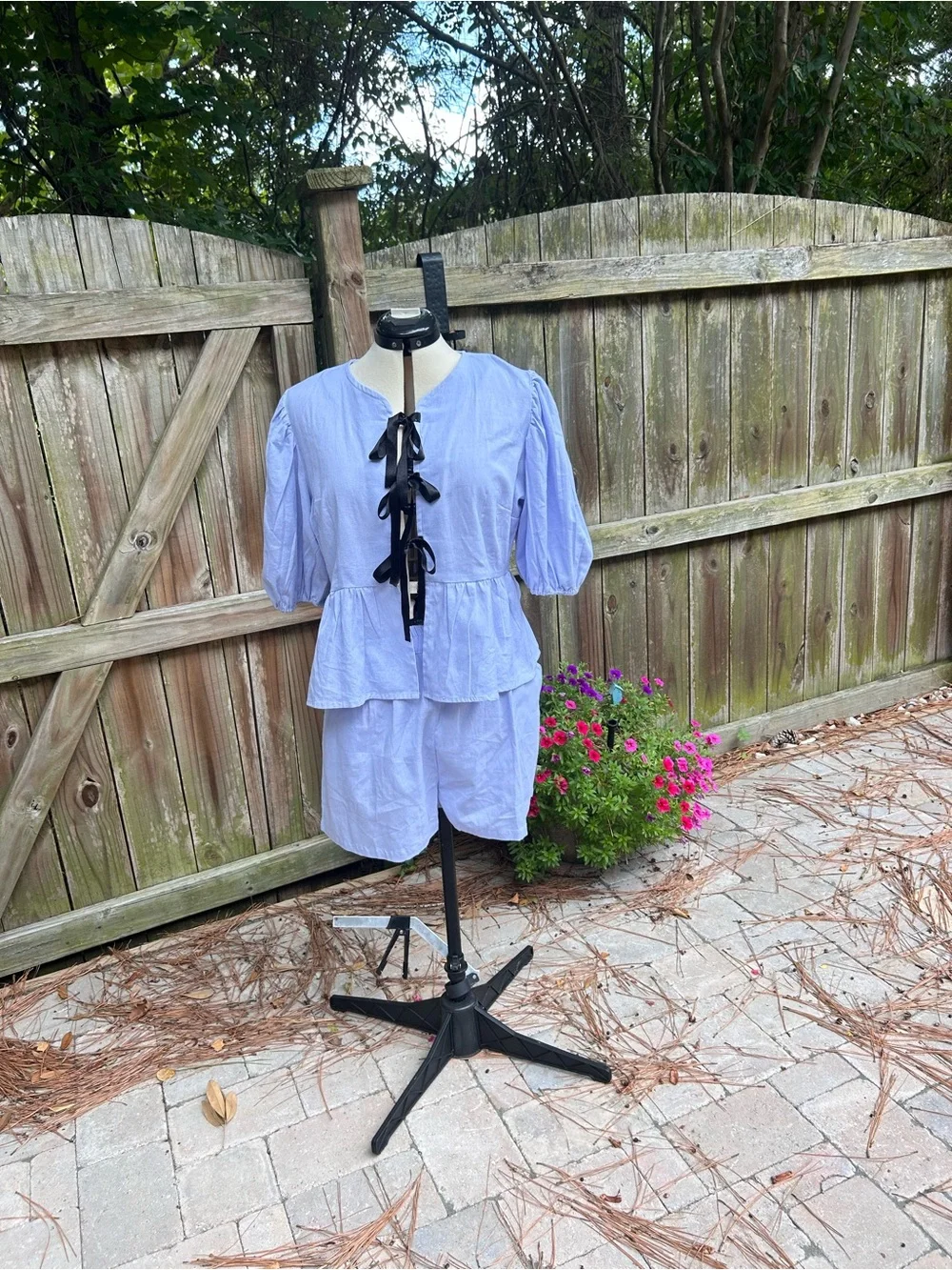 Shorts and blouse light blue set .